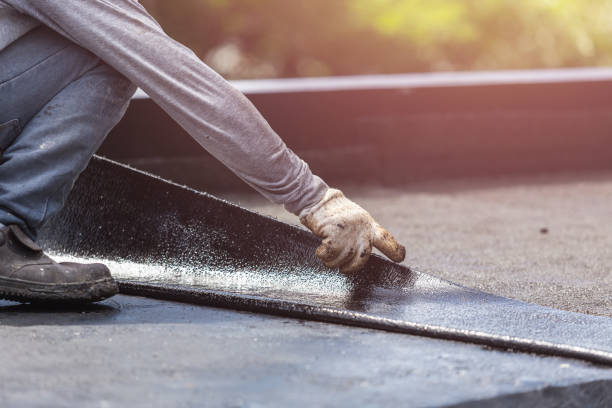 Professional Emergency Waterproofing technician working in Beaumont, KS